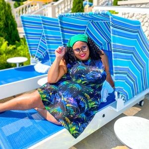 Torrid swimdress! Mesh overlay with palm trees.